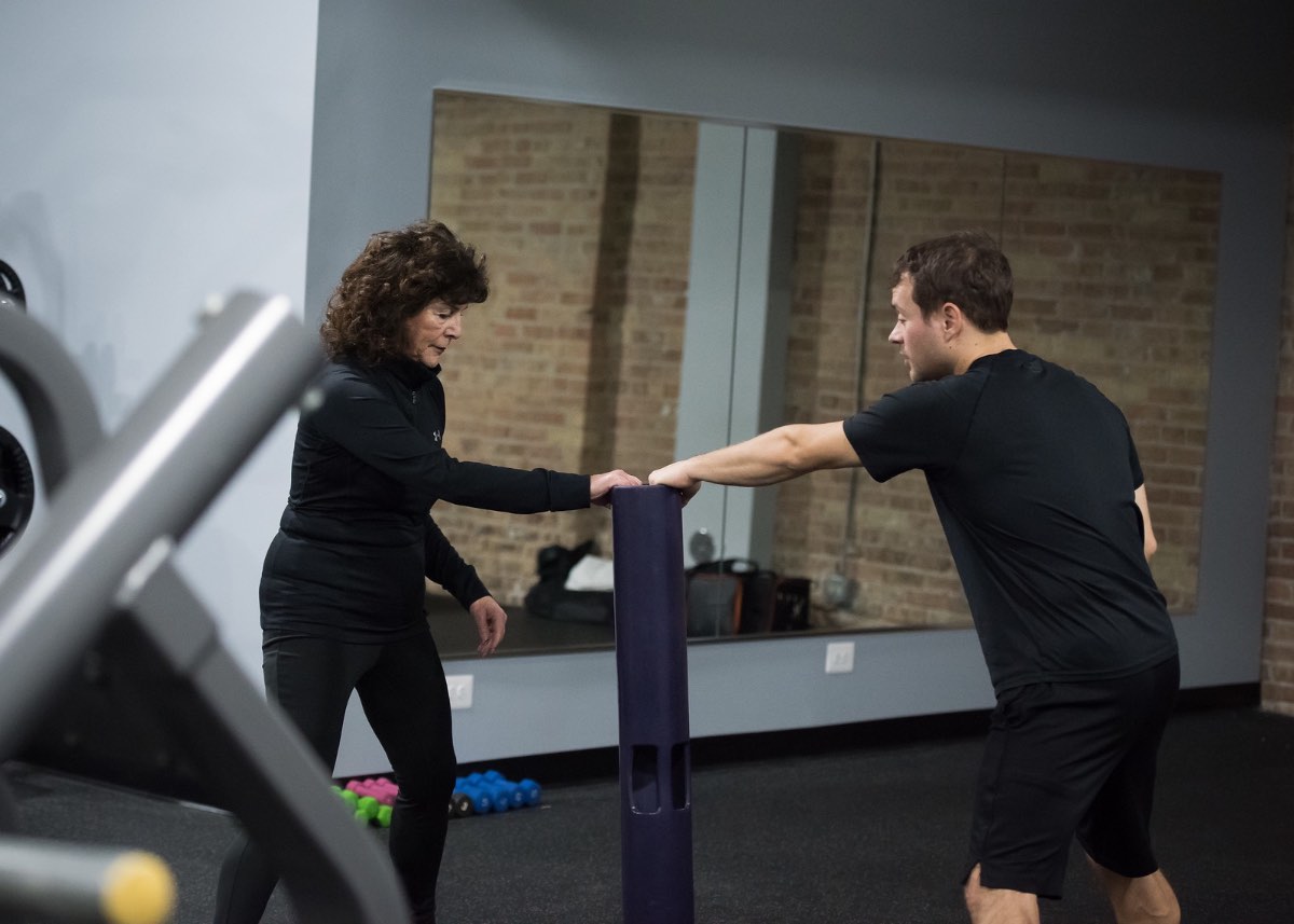 Older adult client rebuilding balance and strength with a Twice as Fit coach after physical therapy